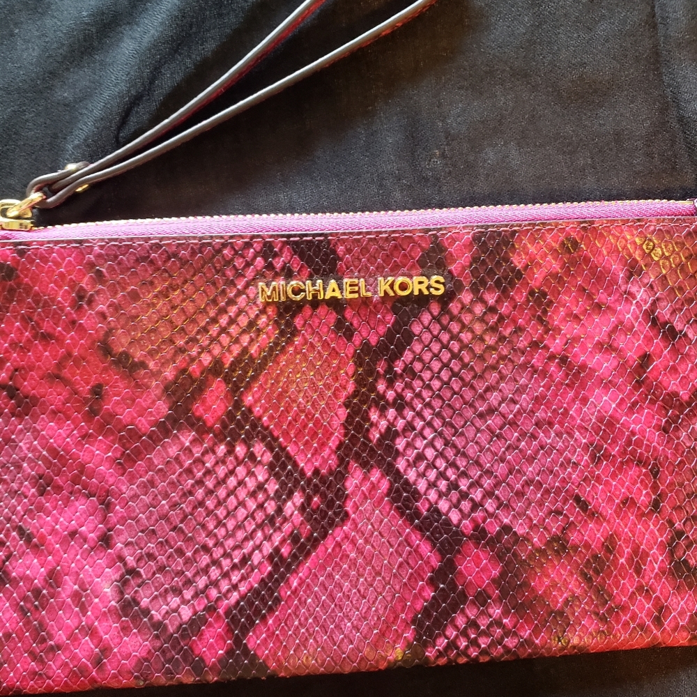 Michael Kors snake clutch.
